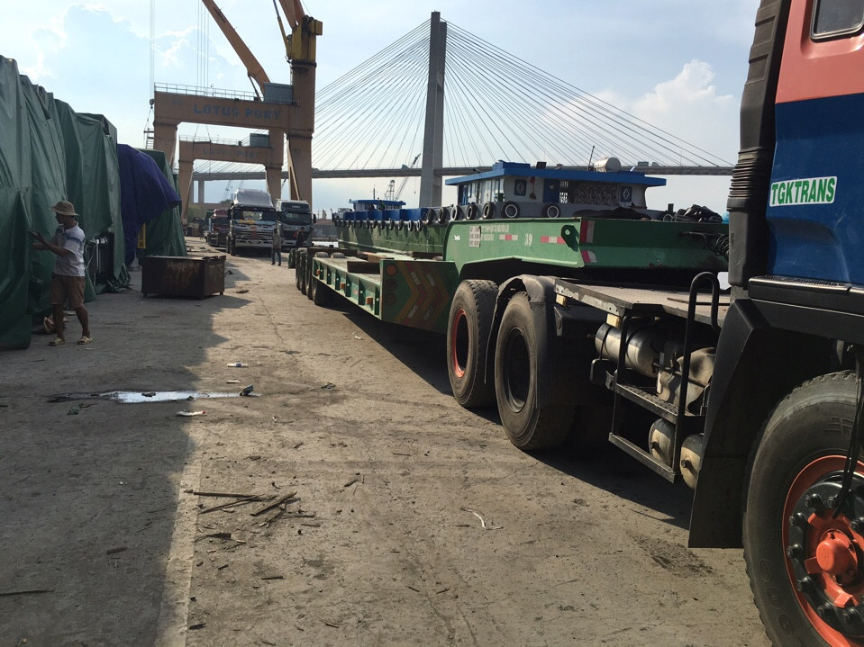 SƠ MI RƠ MOÓC SÀN 45 FEET 3 TRỤC 12 GÙ